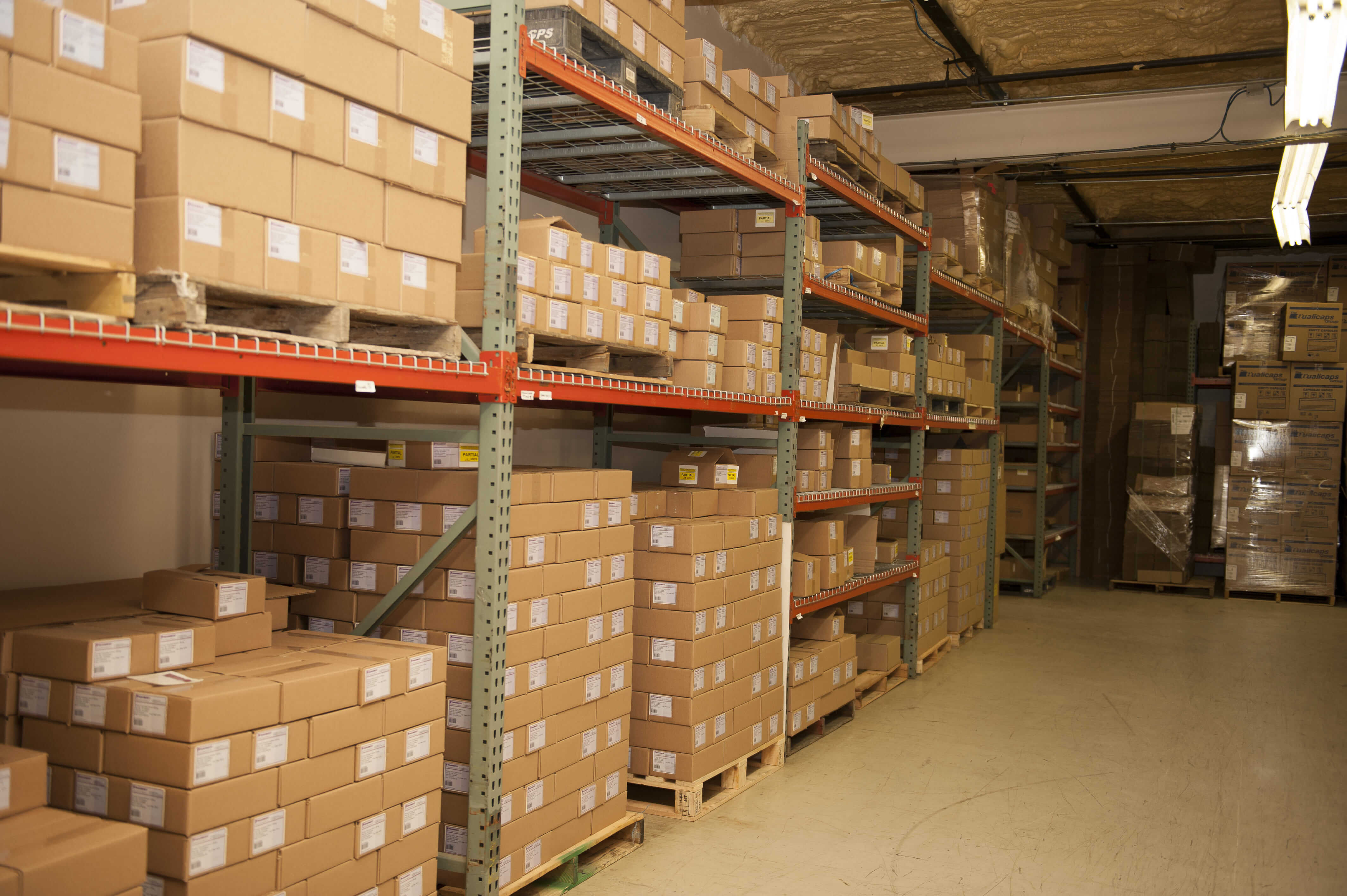 Shelves of product inside Pharbest warehouse